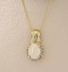 Oval Opal and Diamond Gold Pendant Necklace